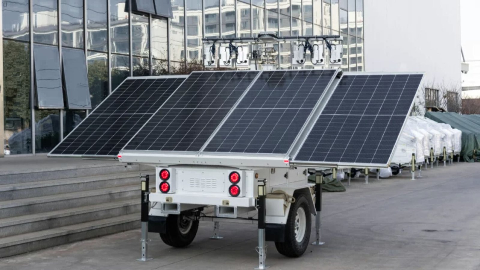 A trailer utilizing solar energy, showcasing two solar panels affixed to its surface.